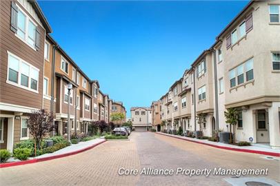 A row of brown and beige townhomes near where Core Alliance provides San Fernando Valley property management